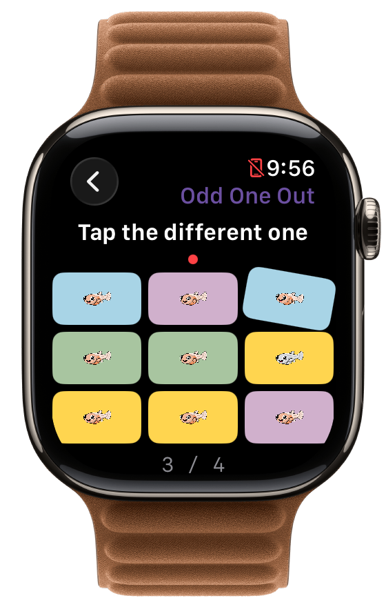 Odd One Out on Apple Watch mid-tap, one tile lifting as it's selected
